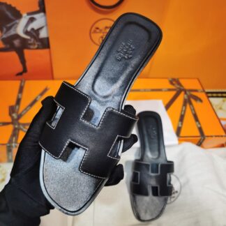 Hermès black handmade slippers
