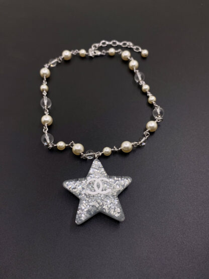 Chanel platinum resin five-pointed star necklace