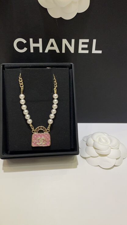 Chanel pink bag necklace