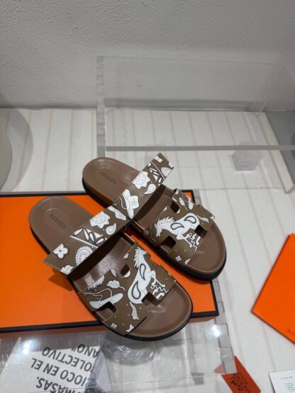 Hermès brown and white couple's woven sandals