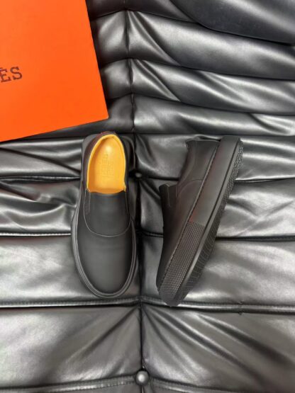 Hermès black leather luxury loafers - Image 2