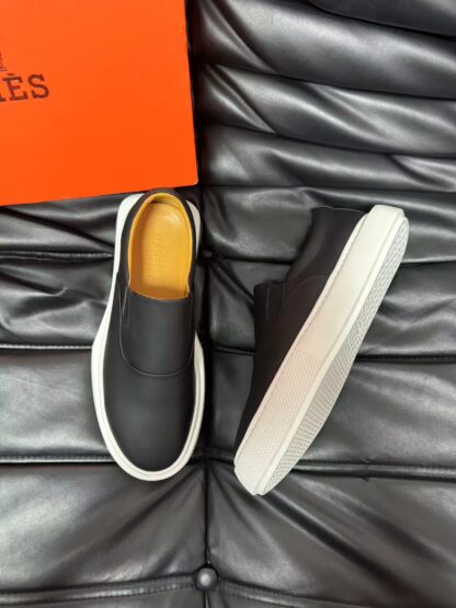 Hermès black and white leather luxury loafers - Image 2