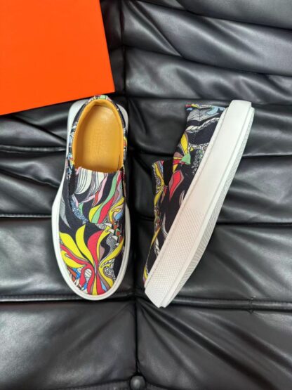 Hermès black and yellow contrast leather luxury loafers - Image 2