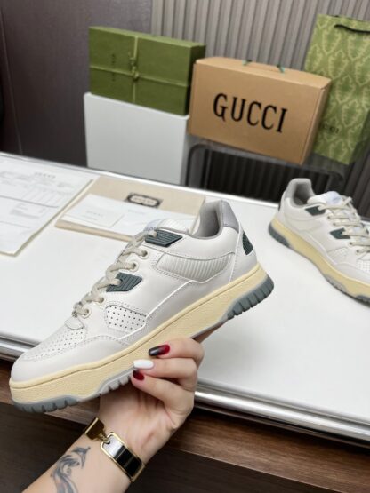 Gucci high and low top distressed sneakers - Image 2