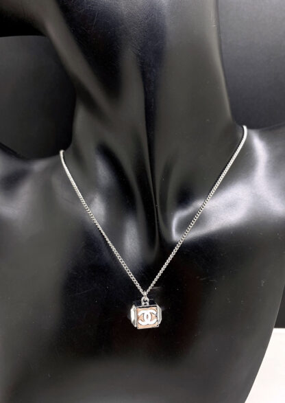 Chanel platinum small cube necklace - Image 3