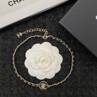 Chanel black gold button leather necklace