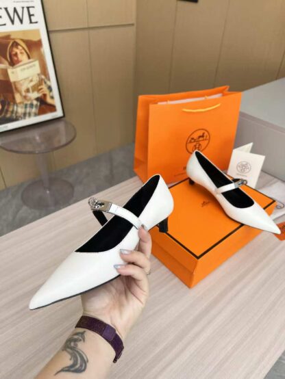 Hermès white loafers are a must-have for holiday wear - Image 2