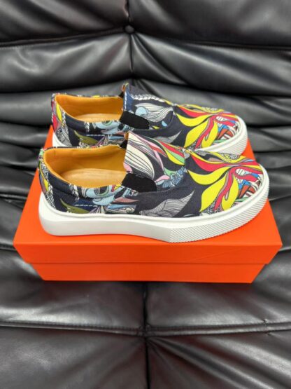 Hermès black and yellow contrast leather luxury loafers - Image 3