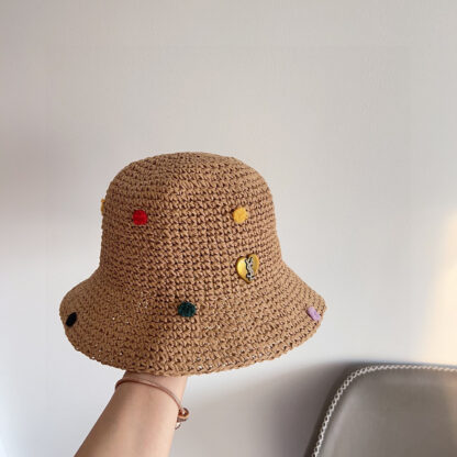 Yves Saint Laurent's new spring and summer polka dot playful woven fisherman hat - Image 3