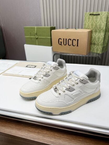 Gucci high and low top distressed sneakers - Image 3