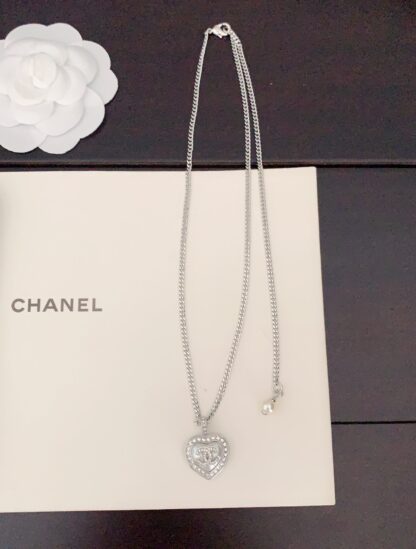 Chanel Gold and White Heart Necklace - Image 3
