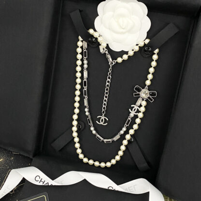 Chanel rhinestone bow pearl double necklace