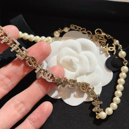 Chanel Letter Pearl Necklace - Image 2