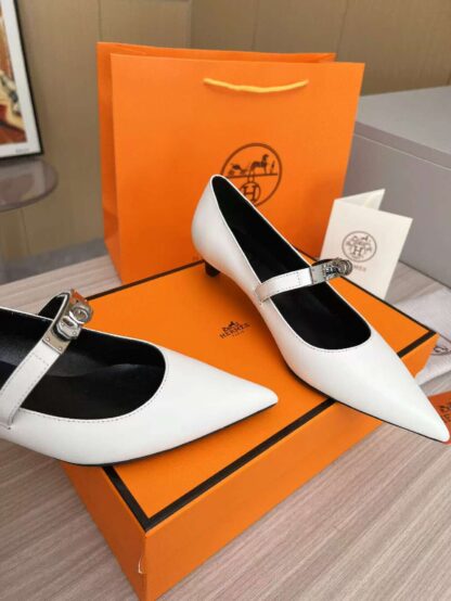 Hermès white loafers are a must-have for holiday wear - Image 3