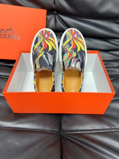 Hermès black and yellow contrast leather luxury loafers - Image 4