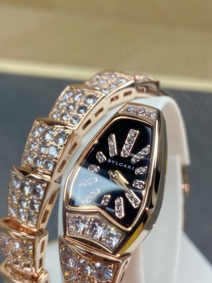 Bulgari rose gold two-circle snake watch - Image 4