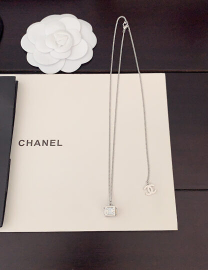 Chanel platinum small cube necklace