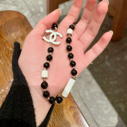 Chanel black and white double C necklace - Image 3