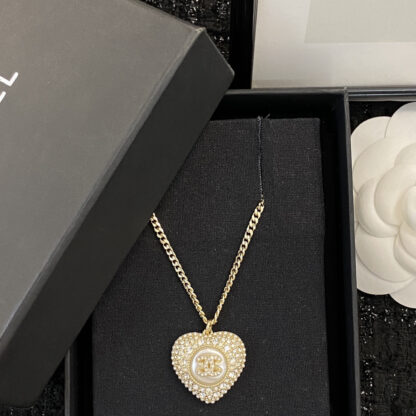 Chanel black and white diamond heart necklace - Image 4