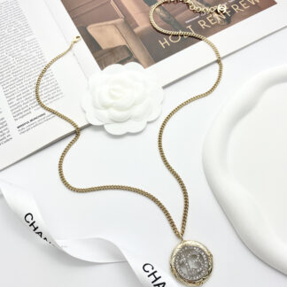 Chanel hollow two-tone round medium long necklace