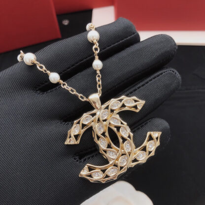 Chanel crystal diamond twist light gold hollow double c necklace - Image 5