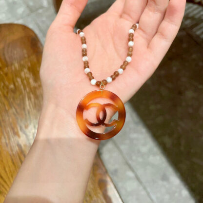 Chanel Pearl Double C Circle Necklace - Image 3