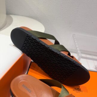 Hermès green and brown woven slippers