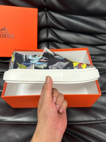 Hermès black and yellow contrast leather luxury loafers - Image 5