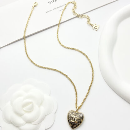 Chanel Black Gold Lace Heart Necklace - Image 5