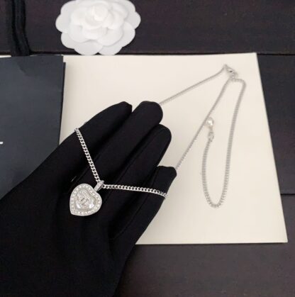 Chanel Gold and White Heart Necklace - Image 4