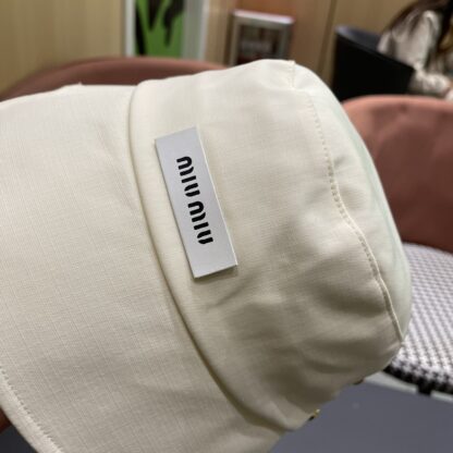 Miu Miu Simple and stylish bucket hat - Image 7