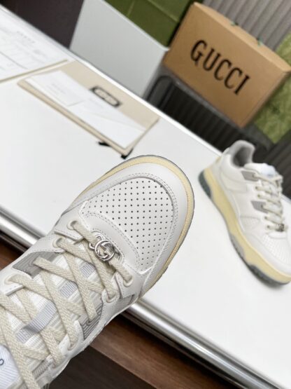 Gucci high and low top distressed sneakers - Image 6