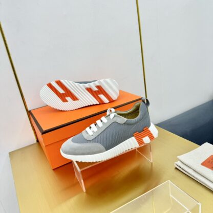 Hermès Spring and Summer Gray and Orange Colorblock Couple Classic Sports Casual Shoes - Image 6