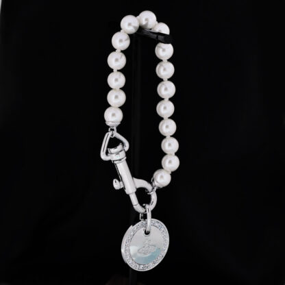 Vivienne Westwood zircon medal triangle clasp pearl bracelet - Image 6