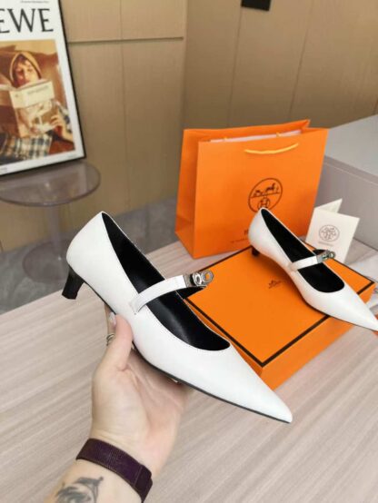 Hermès white loafers are a must-have for holiday wear - Image 6
