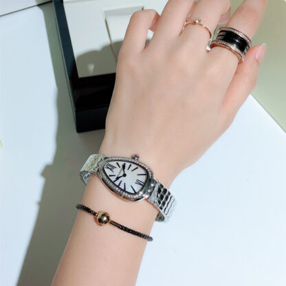 Bulgari's slim and shining classic snake shadow watch - Image 7