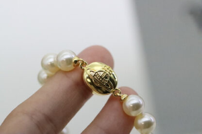 Vivienne Westwood Round Black Enamel Saturn Pearl Bracelet - Image 7