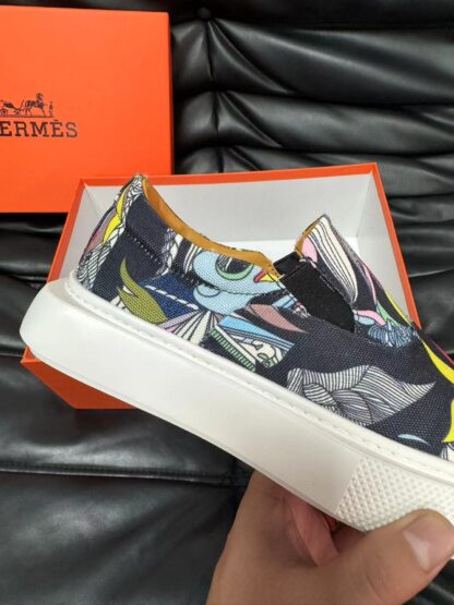 Hermès black and yellow contrast leather luxury loafers - Image 8