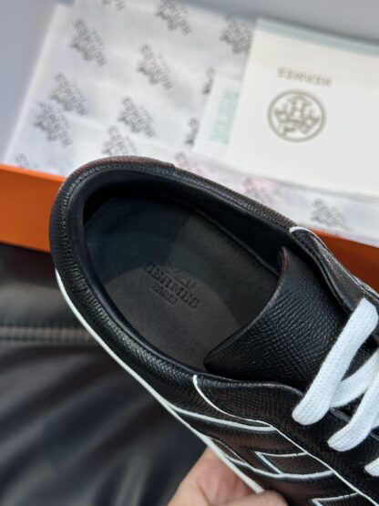 Hermès men's soft and lightweight black and white low-top casual sneakers - Image 8