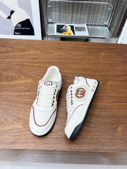 Gucci low-top distressed sneakers