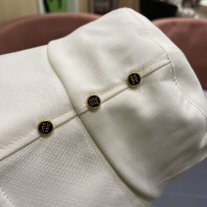 Miu Miu Simple and stylish bucket hat - Image 9