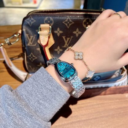 Bulgari's stunning gilded snake watch - Image 8