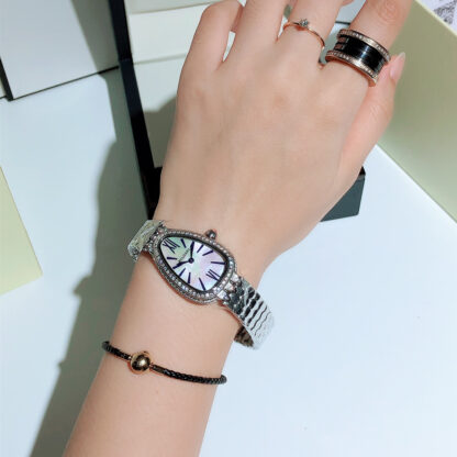 Bulgari's slim and shining classic snake shadow watch - Image 8
