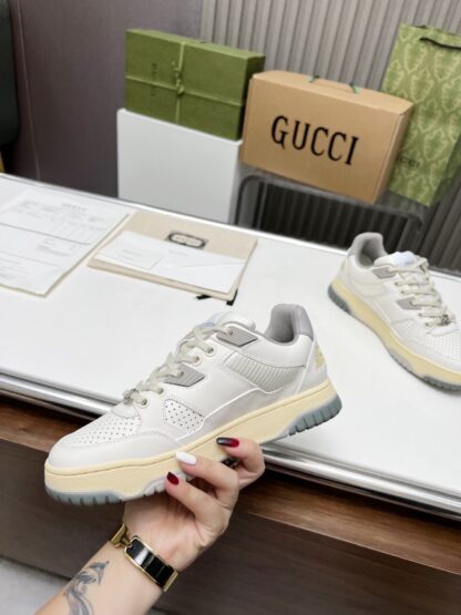 Gucci high and low top distressed sneakers - Image 8