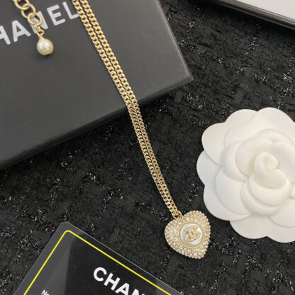 Chanel black and white diamond heart necklace - Image 8
