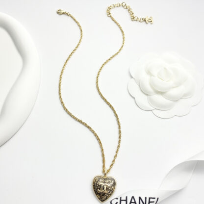Chanel Black Gold Lace Heart Necklace - Image 8