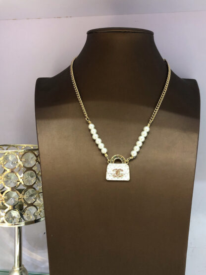 Chanel diamond pattern bag necklace - Image 8