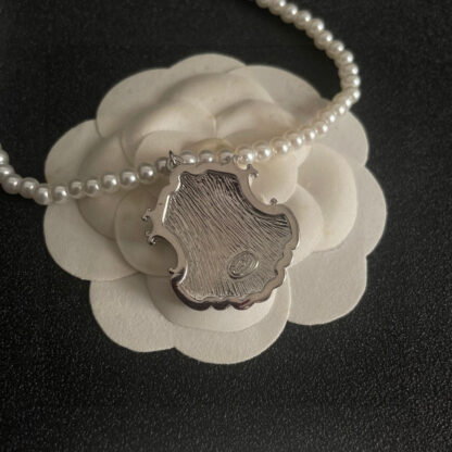 Chanel Pearl Double C Necklace - Image 6