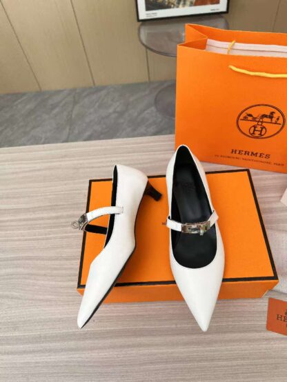 Hermès white loafers are a must-have for holiday wear - Image 8