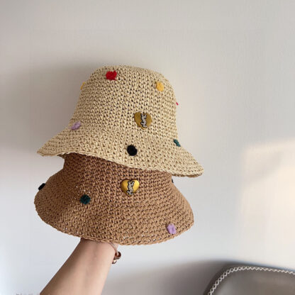 Yves Saint Laurent's new spring and summer polka dot playful woven fisherman hat - Image 9